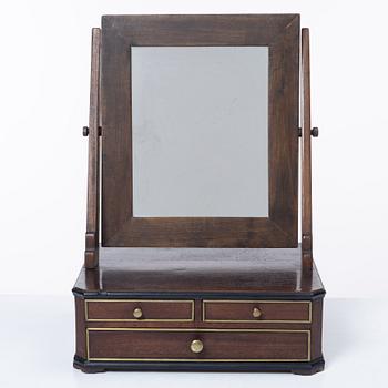A mahogany table mirror, Sweden, dated 1820.
