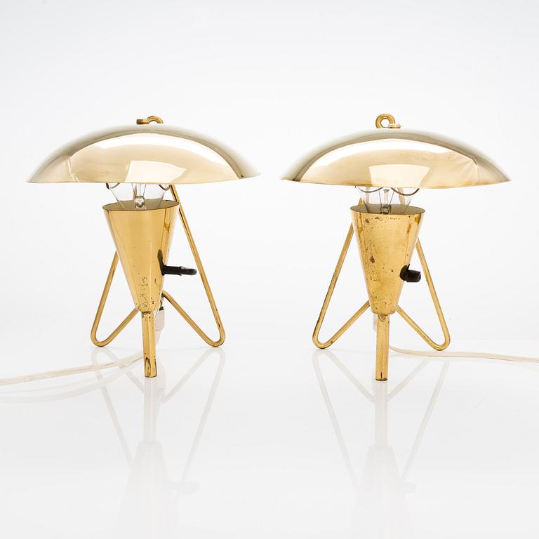 Two mid-20th-century wall lights / table lamps, model EV 57 for Itsu, Finland.