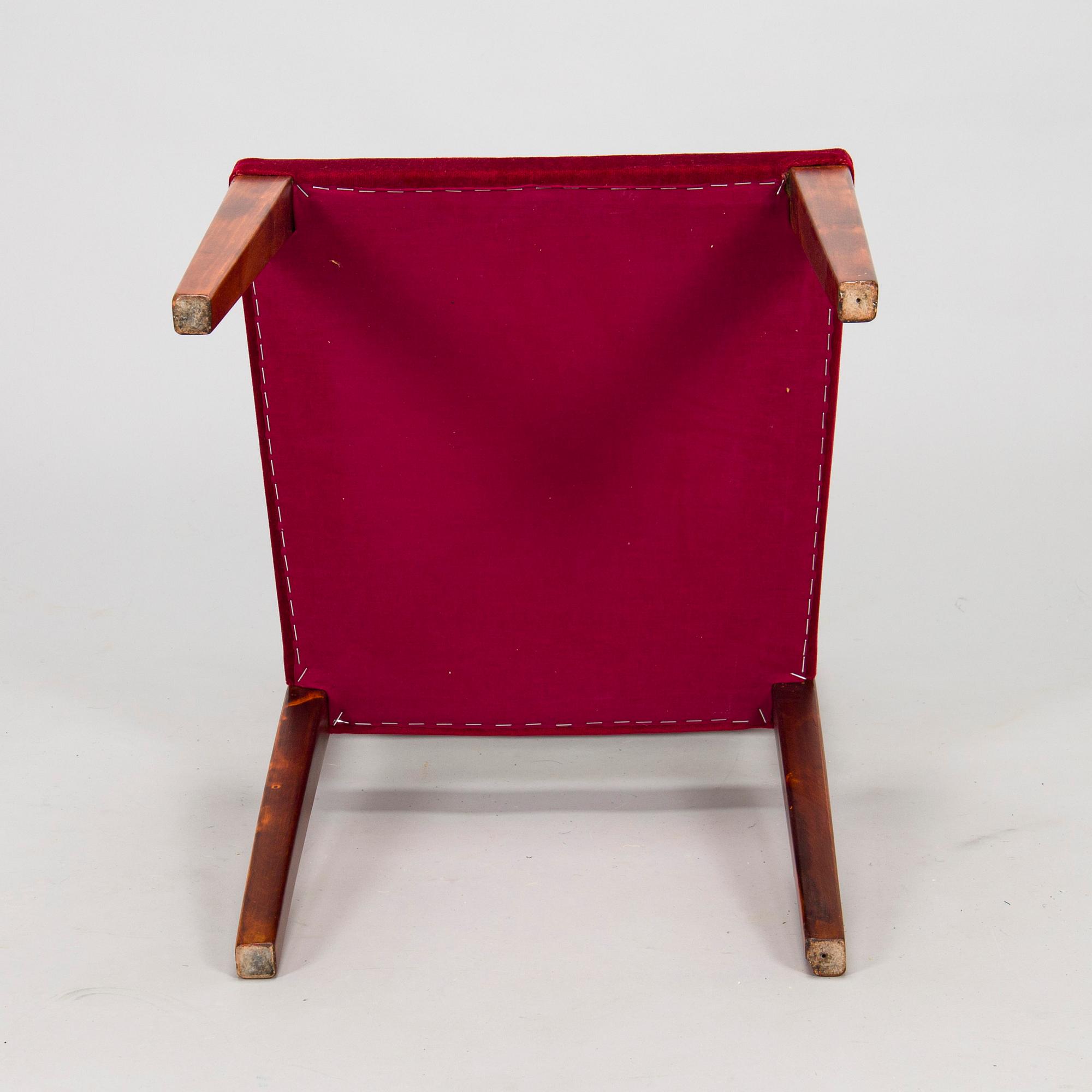 A mid 20th century dining table and a set of four chairs, Oy Boman Ab and two chairs Werner West.