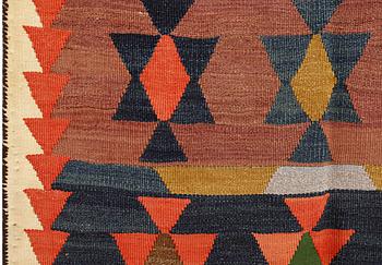 A Persian Nomad Kilim carpet, c 248 x 150 cm.