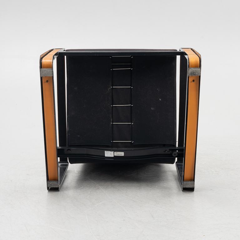 Jean Prouvé, a 'Cité' easy chair, Vitra, 2012.