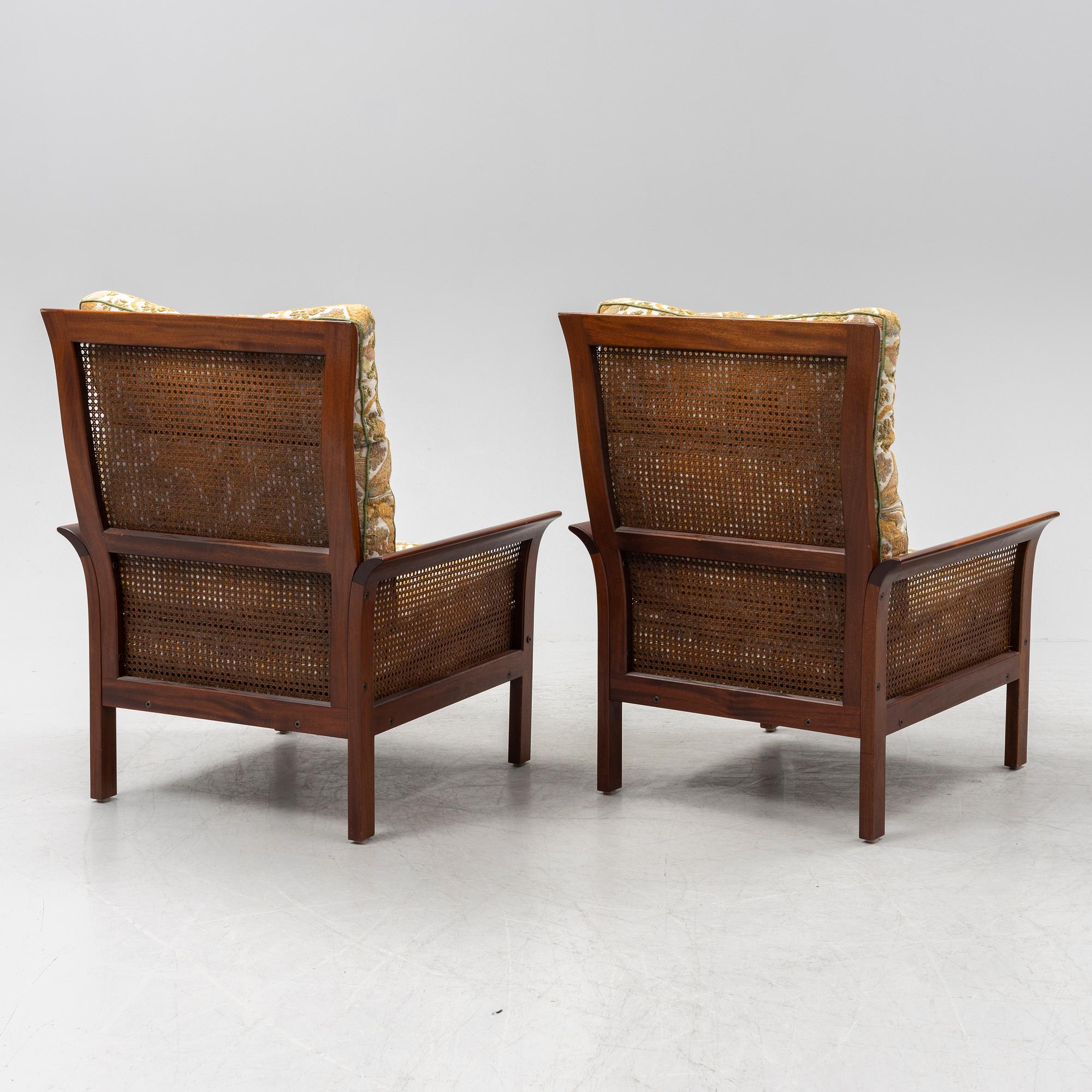 Arne Norell, a pair of 'Rotang' easy chairs, Norell Möbel AB, Sweden.