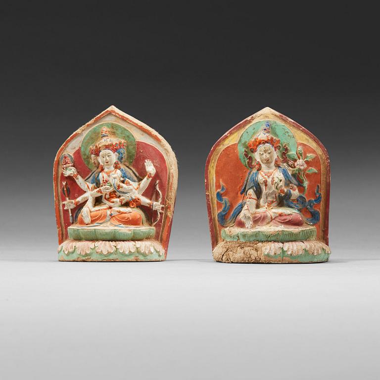 Two clay tsa-tsas, Tibet, 18/19th Century.