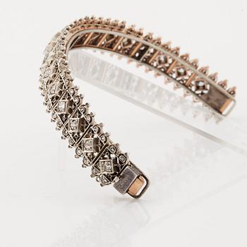 A tiara/bracelet set with old and rose cut diamonds.