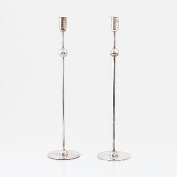 A pair of 'Kulan' candle sticks by Estrid Ericson for Firma Svenskt Tenn.