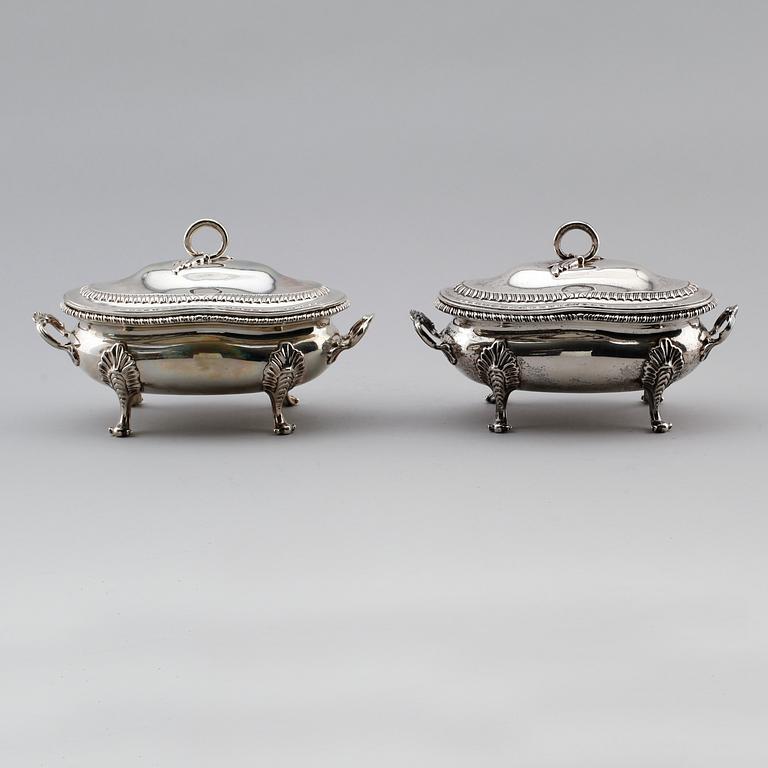 A pair of English 18th century silver sauce-tureens, marks of Sebastian & James Crespell, London 1772.