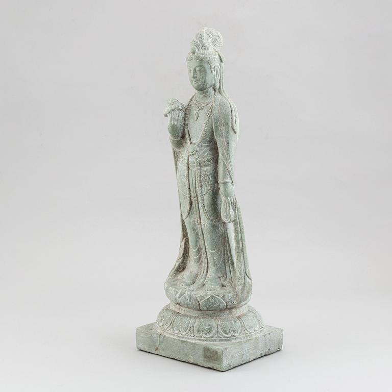 A carved Chinese stone figurine of Guanyin, first half of the 20th century.