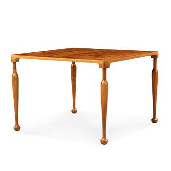 A Josef Frank walnut top sofa table, Svenskt Tenn, model 2181.