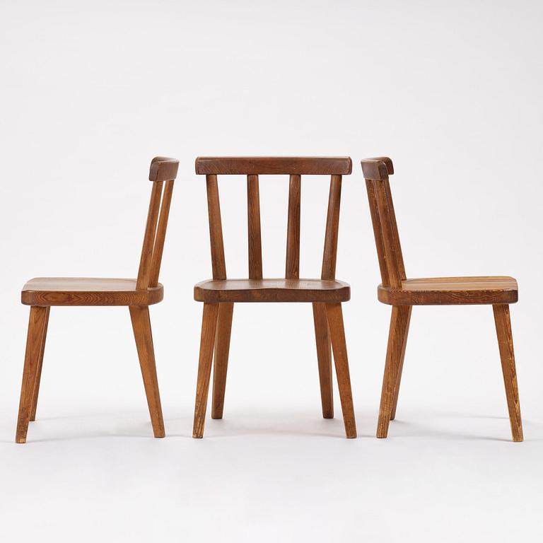 Axel Einar Hjorth, a set of three stained pine "Utö" chairs, Nordiska Kompaniet, Sweden, 1930s.