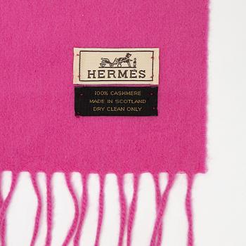 Hermès, a pink cashmere scarf.