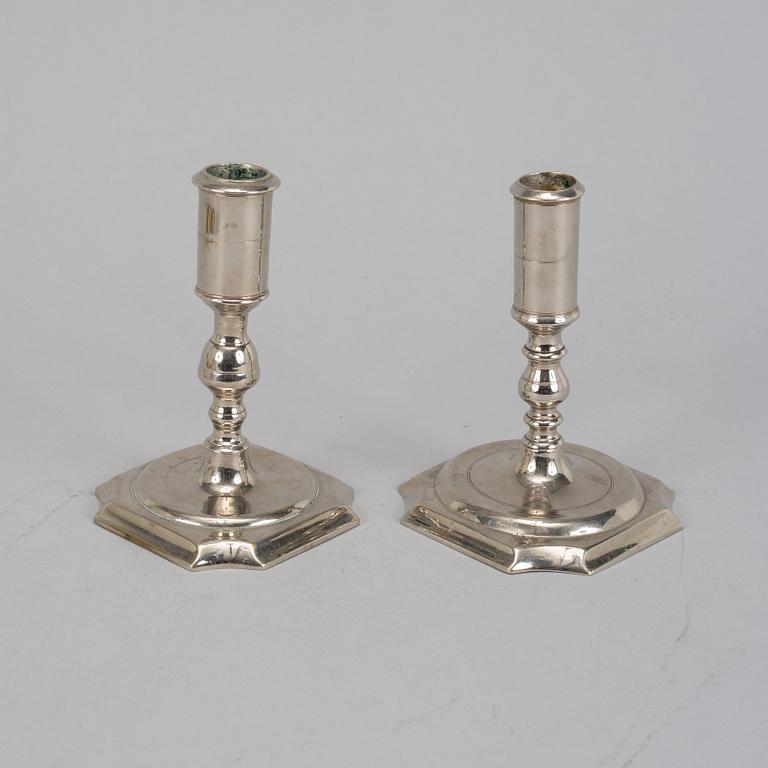 Two Swedish 18th century candlesticks.