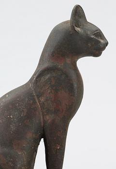 A bronze cat statuette, Egypt, possibly 22-30 Dynasty, 945-332 BC.