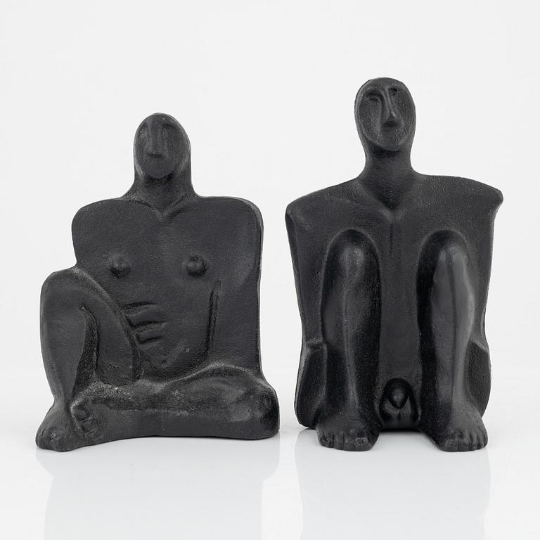 Marita Norin, skulpurer/bokstöd, ett par, monogramsignerade.