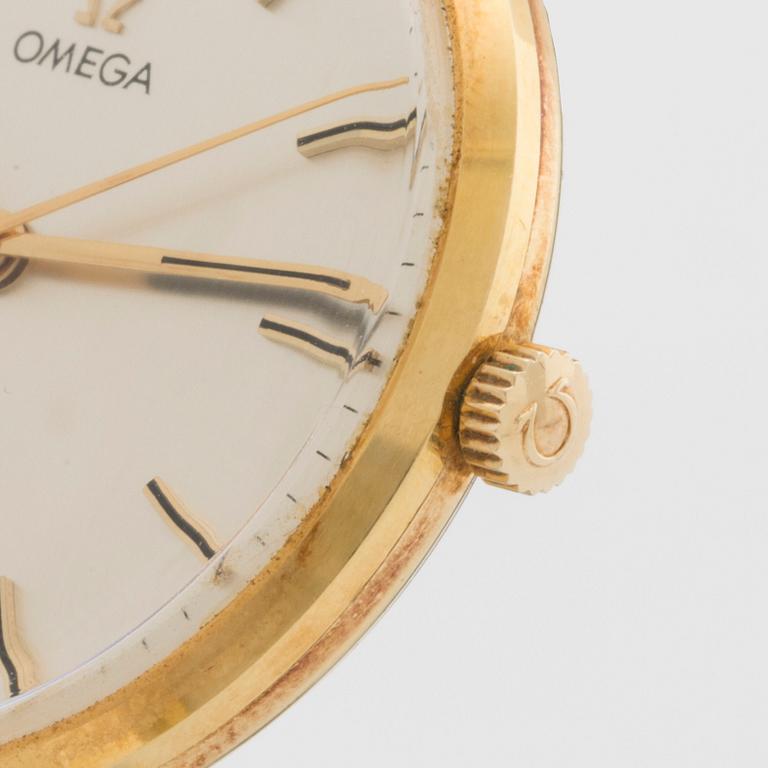 A 14 ct gold Omega Geneve wrist watch.