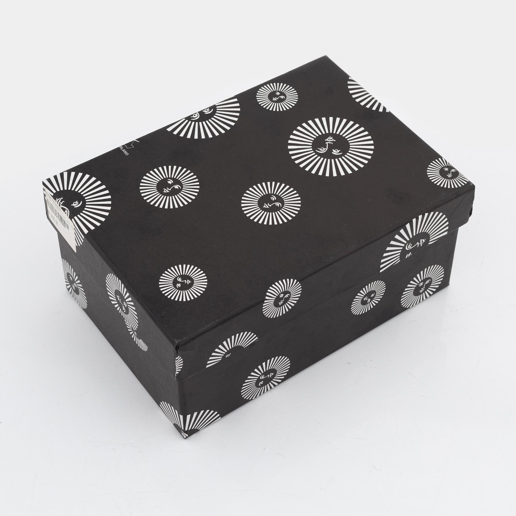 Piero Fornasetti, a pair of metal book stands.