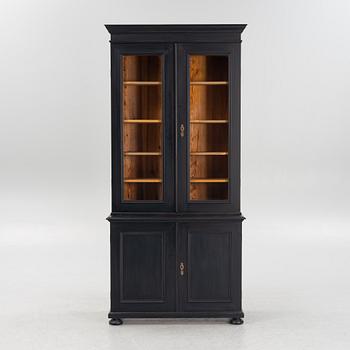 A cabinet, around the year 1900.