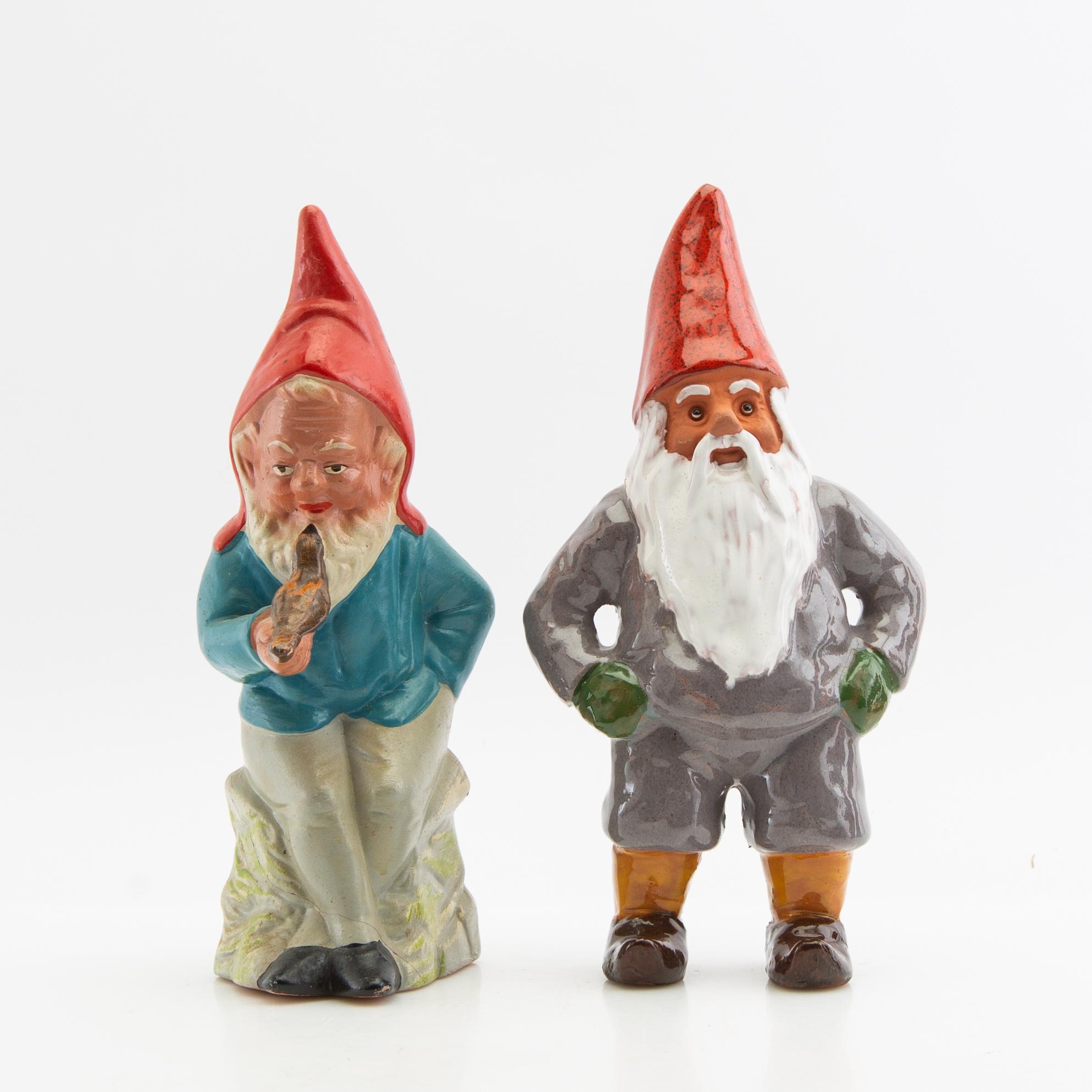 A collection of gnomes 12 pcs mid/late 20th century mostly painted terracotta.