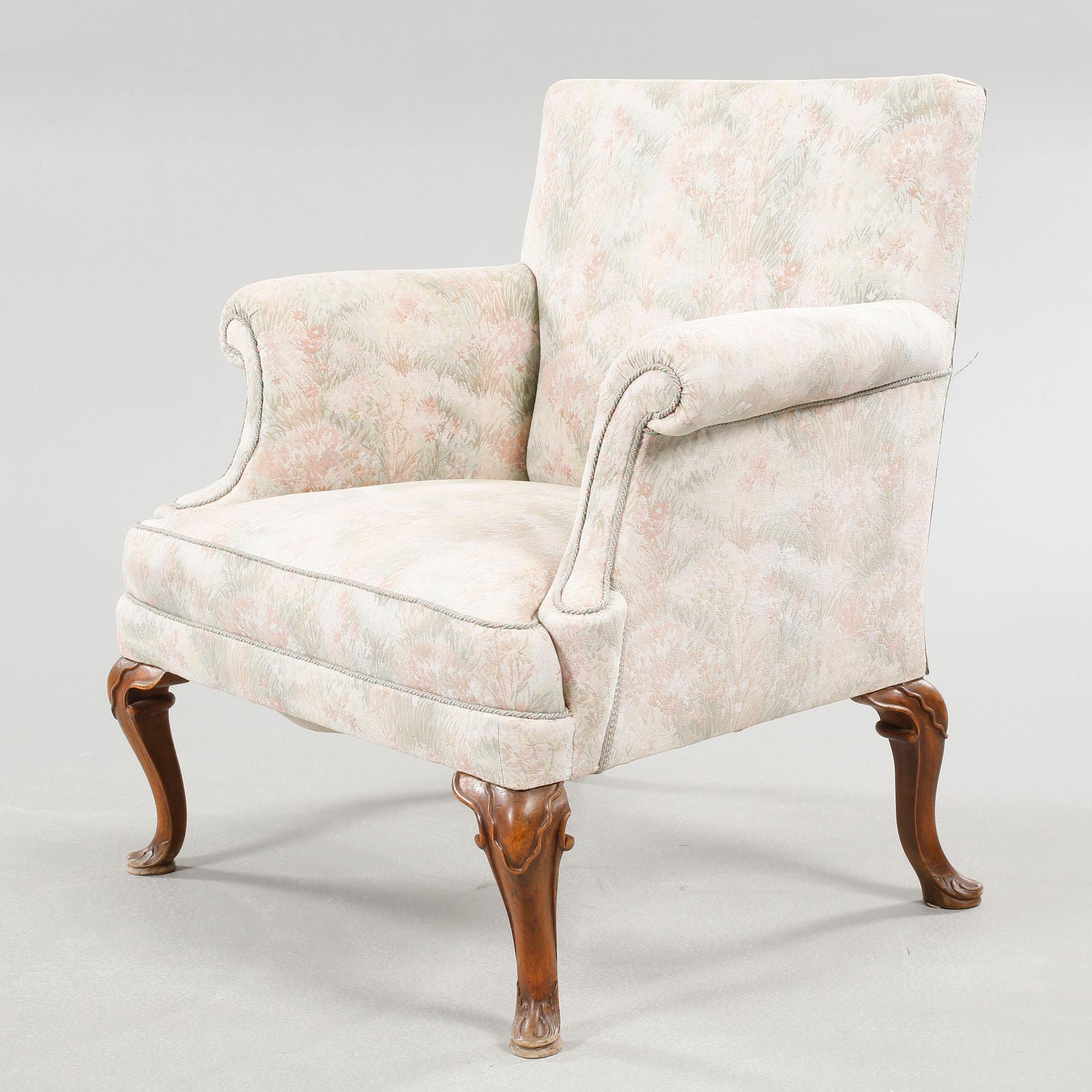 A Queen Anne style armchair, early 20th century.