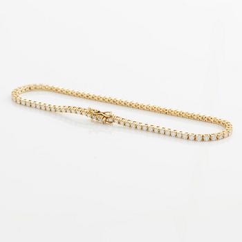 Tennis bracelet, 14K gold with brilliant-cut diamonds.