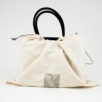 A handbag Reed Kaakoff.