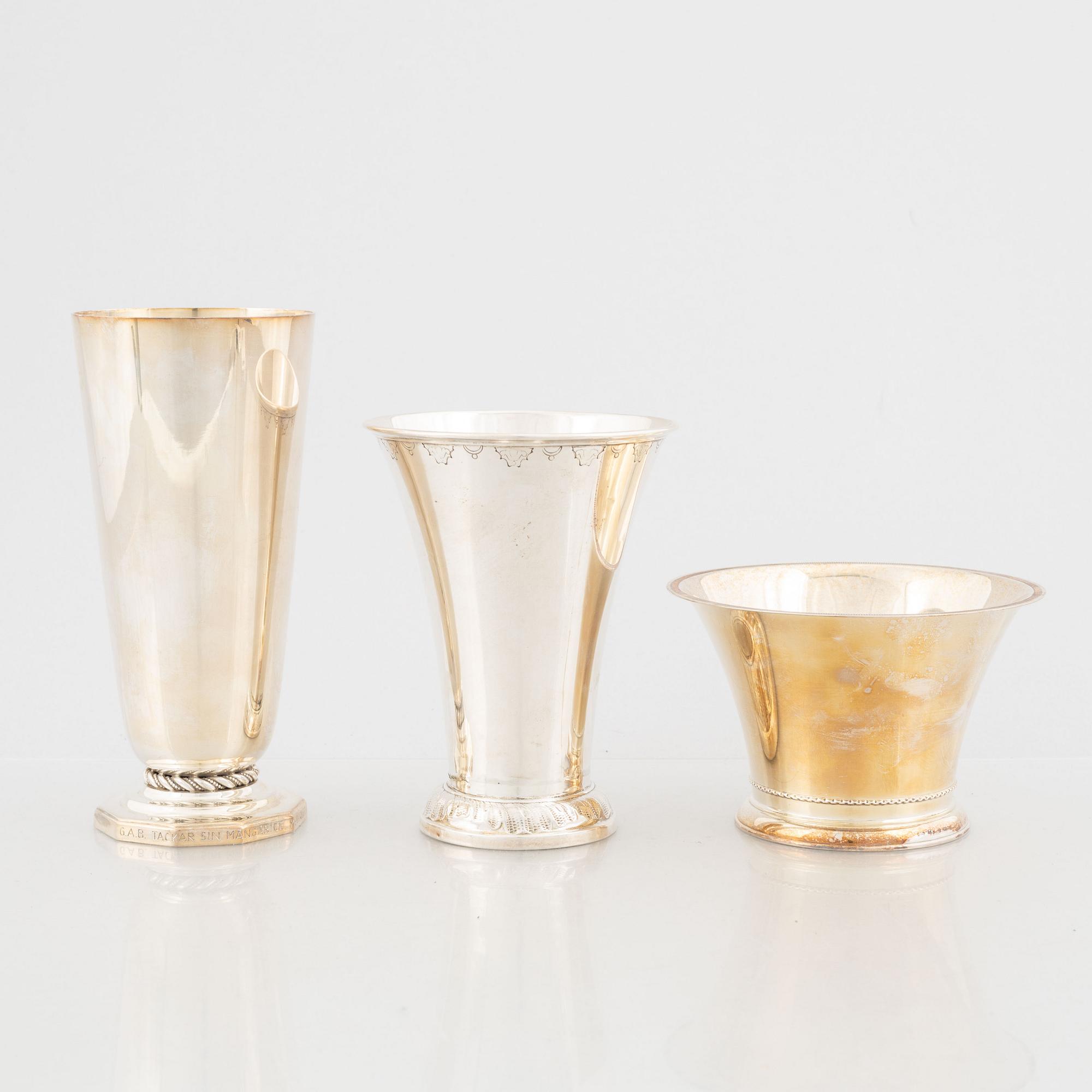A Swedish Silver Beaker, Vase and Bowl, mark of Guldsmedsaktiebolaget, Stockholm 1906-56.