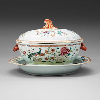 255. A large famille rose 'double peacock' tureen with cover and stand, Qing dynasty, Qianlong (1736-95).