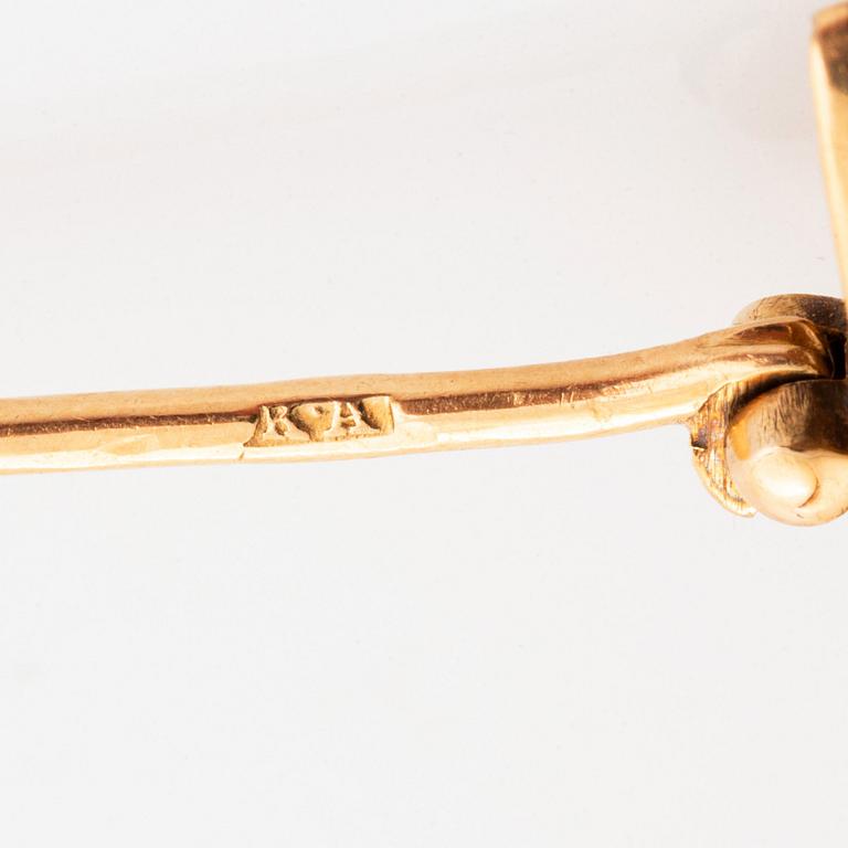 Brosch platina och 14K guld med en gammalslipad diamant ca 1.05 ct kvalitet ca H si.