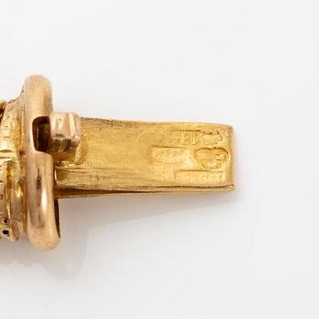 A necklace in 18K gold.