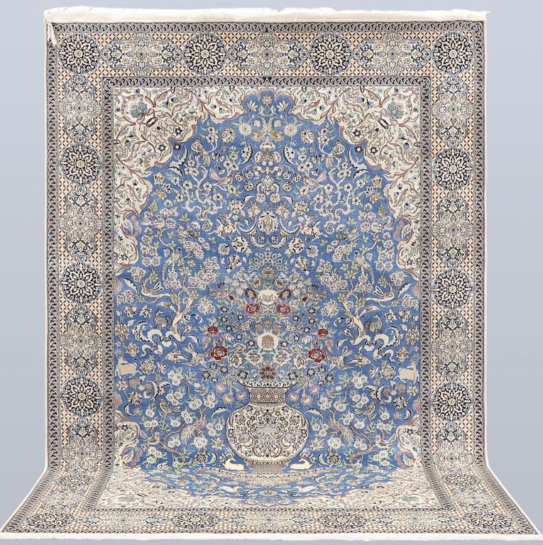 A Figural Nain-Isfahan carpet, part silk, 318 x 213 cm.