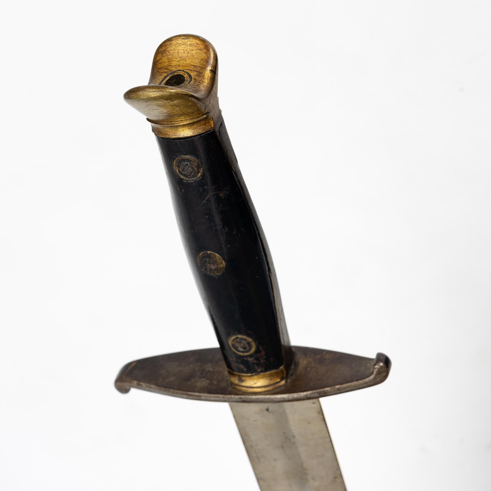 A Swedish cutlass 1810 pattern, with scabbard.