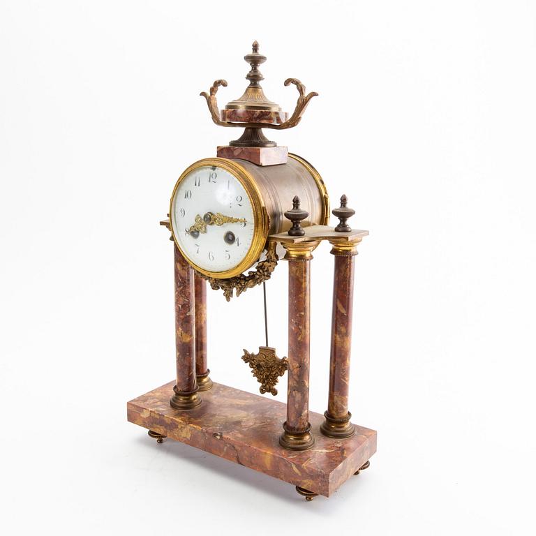 A Louis XVI style table clock first half of the 20th century.