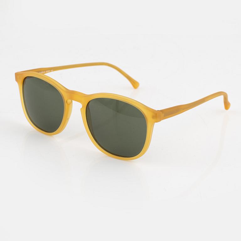 Illesteva, a pair of yellow sunglasses.