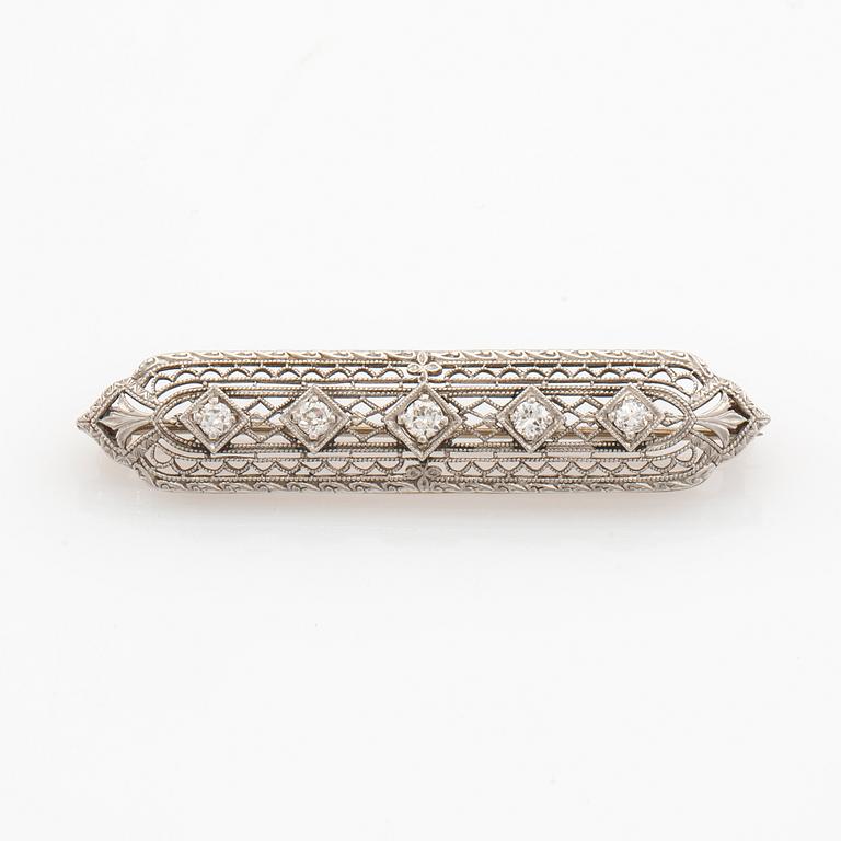 Brooch 14K white gold with round old-cut diamonds.