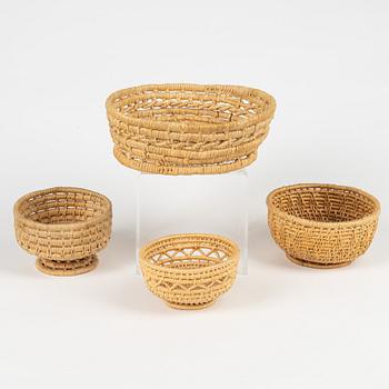 Four root bowls and eight napkin rings.