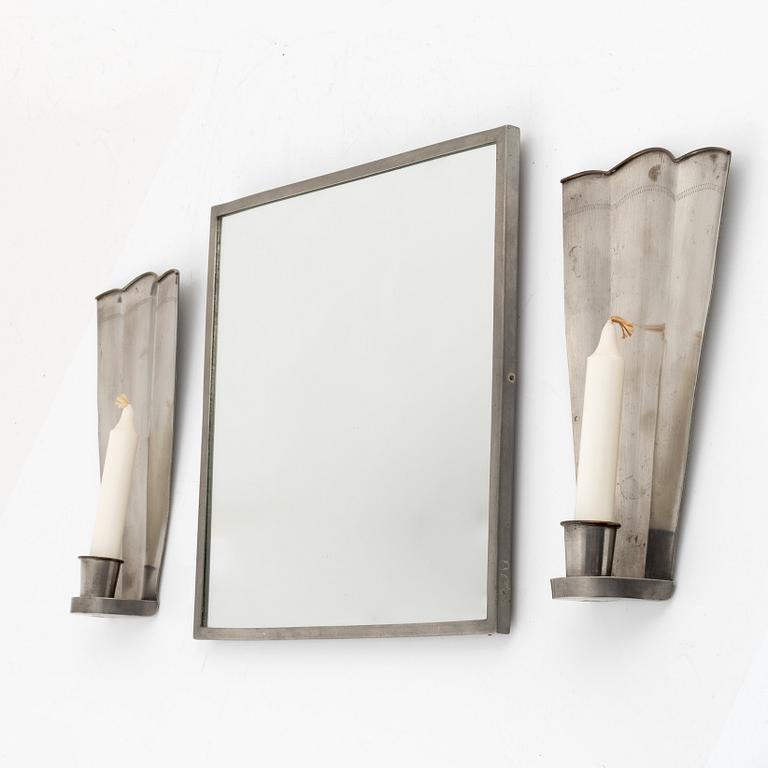 Nils Fougstedt, A pair of pewter sconces and a mirror, Firma Svenskt Tenn, 1940 and -29.