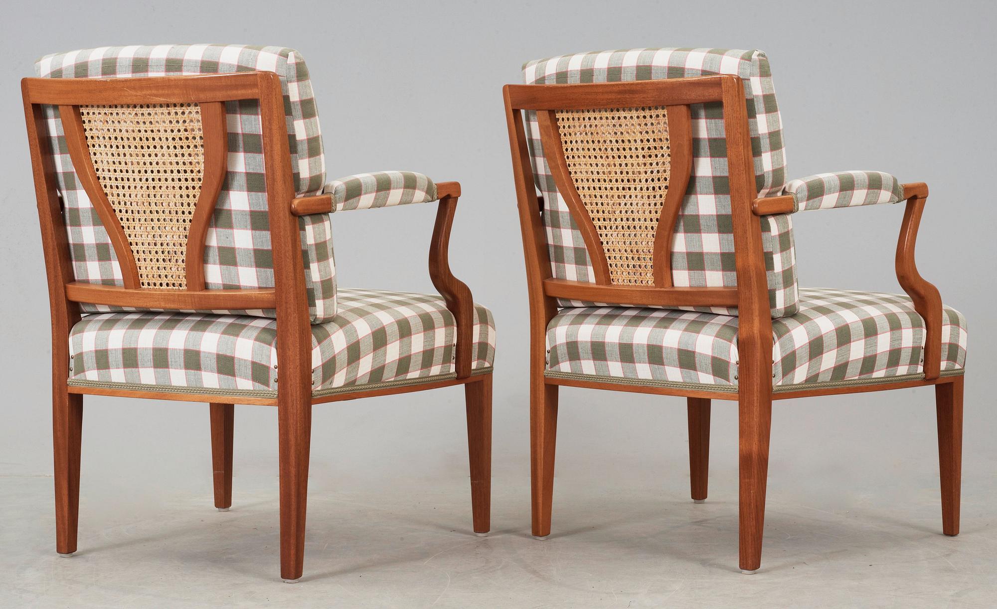 A pair of Josef Frank mahogany armchairs, Svenskt Tenn Sweden.