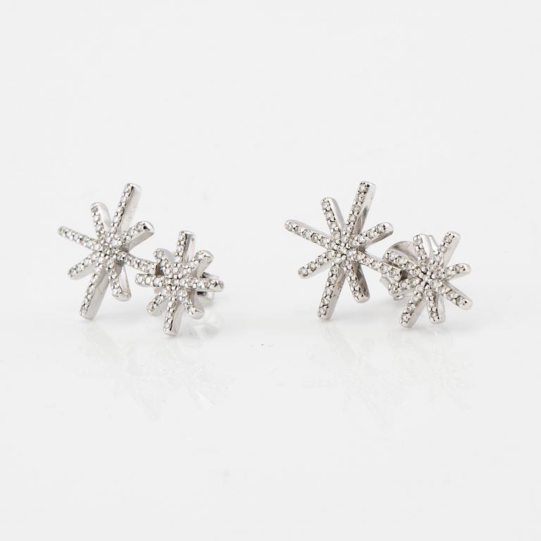 Efva Attling, a pair of "Beam & Stars Two Ear" earrings in rhodium-plated sterling silver with round brilliant-cut diamonds.