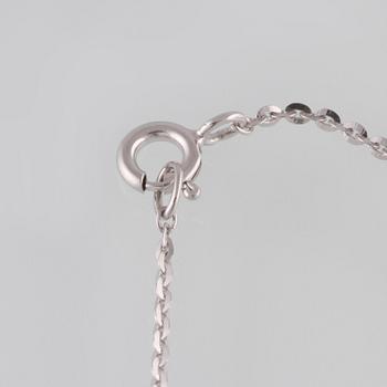 ARMBAND, 18K guld och vitguld med briljantslipade diamanter ca 0.07 ct. Vikt 2,0 gram.