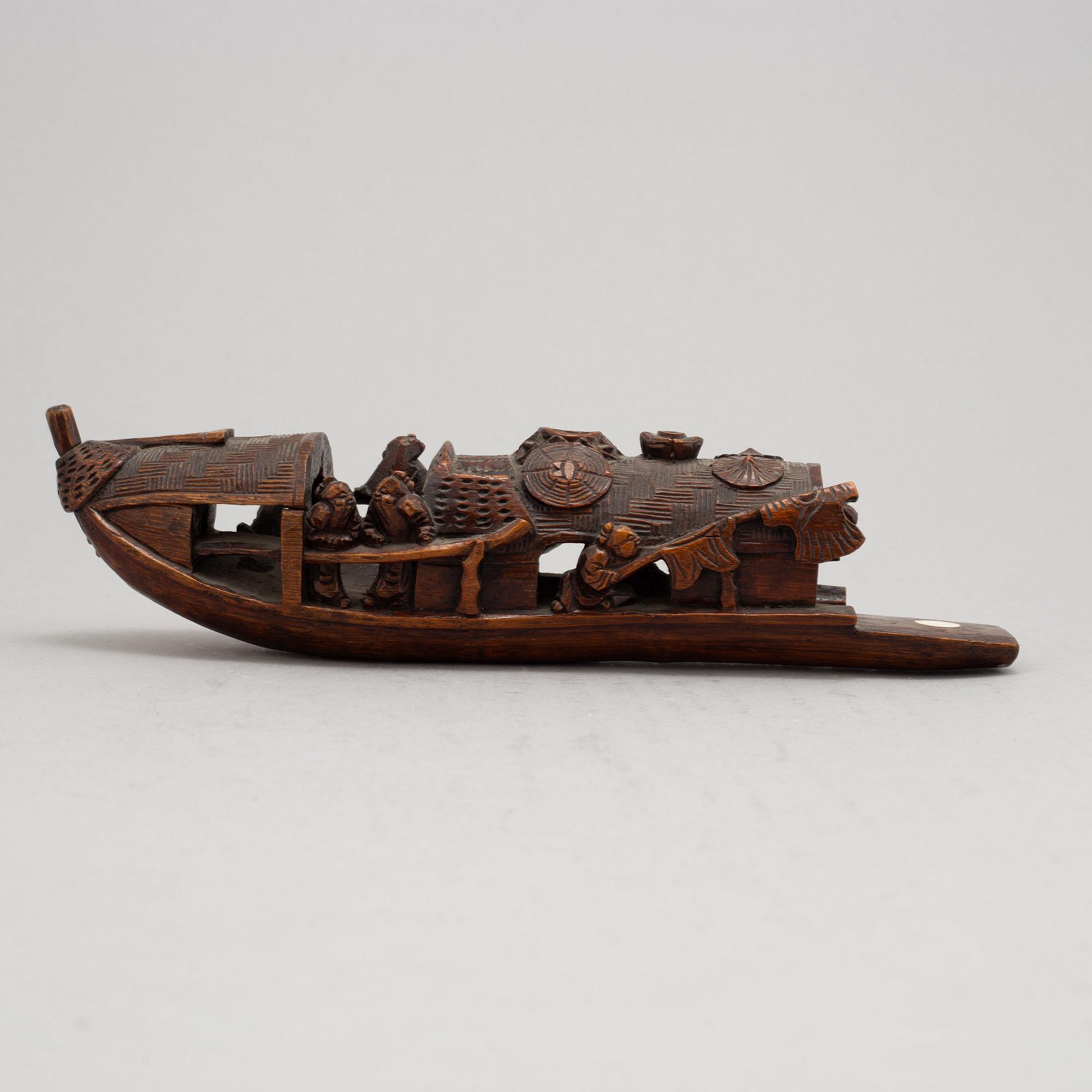 A Chinese bamboo sculpture of a boat, 20th Century.