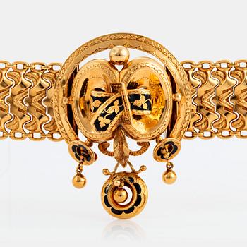 1101. An 18K gold and enamel bracelet, by Möllenborg.