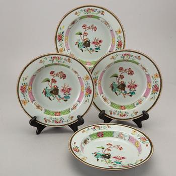 A set of four Chinese famille rose Qianlong porcelain plates.