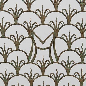 A radiator cover, metalwork, likely Taidetakomo Hakkarainen, 1930s.