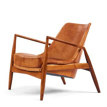 503. Ib Kofod-Larsen, a teak and cognac coloured leather 'Sälen' easy chair, Olof Perssons Fåtöljindustri (OPE), Sweden, 1950-60s.