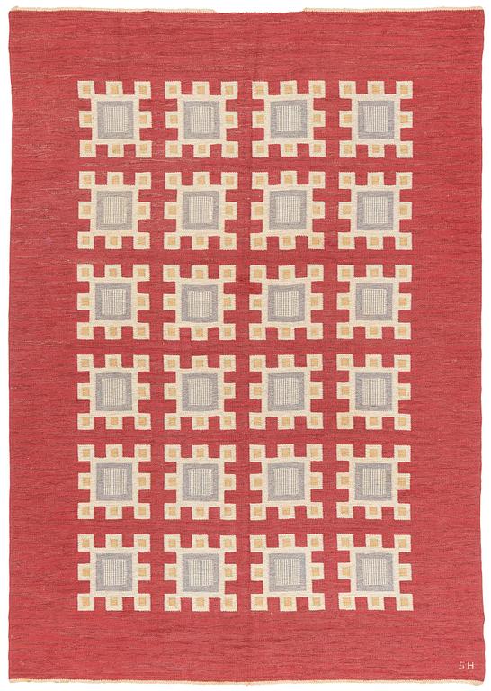 Edna Martin, a carpet, 'Oktandria, röd', flat weave, approximately 323 x 227 cm, signed SH (Svensk hemslöjd).