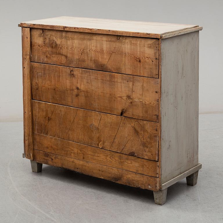 A mid 19th century painted chest of drawers.