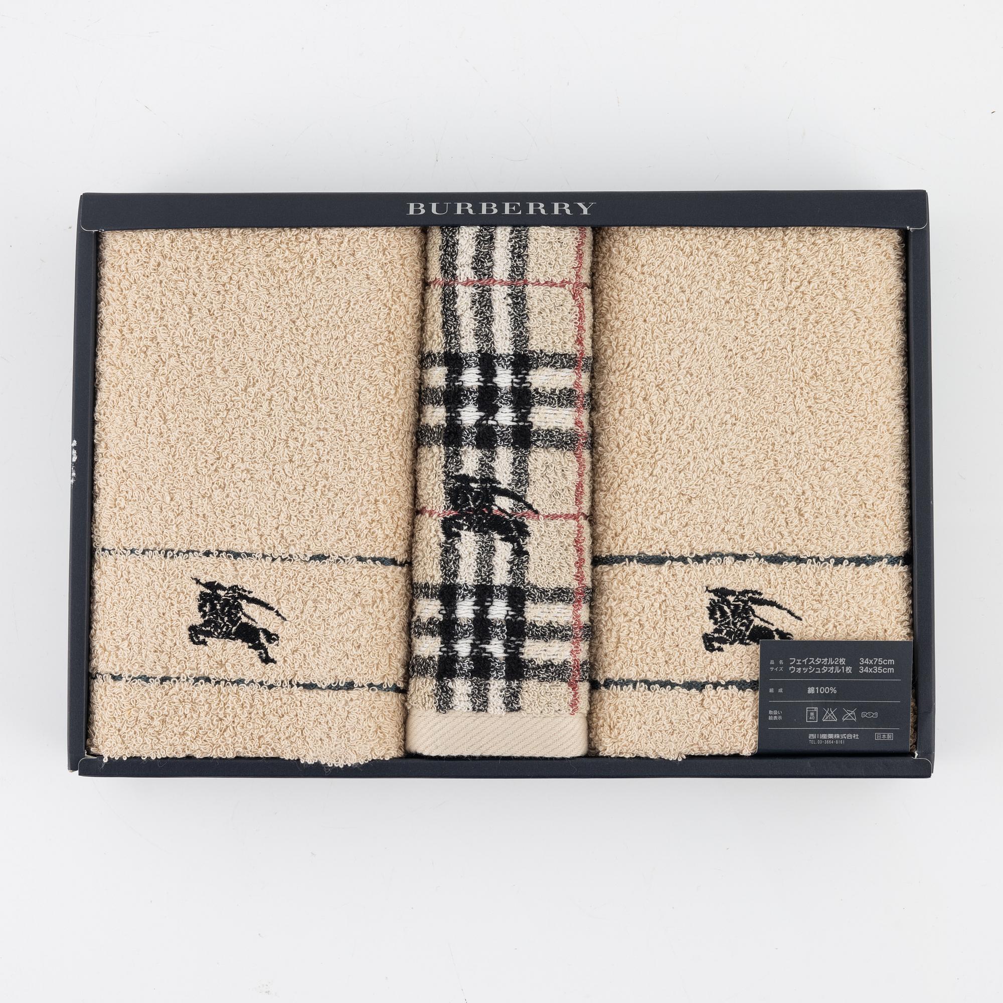 Burberry, a set of three towels.