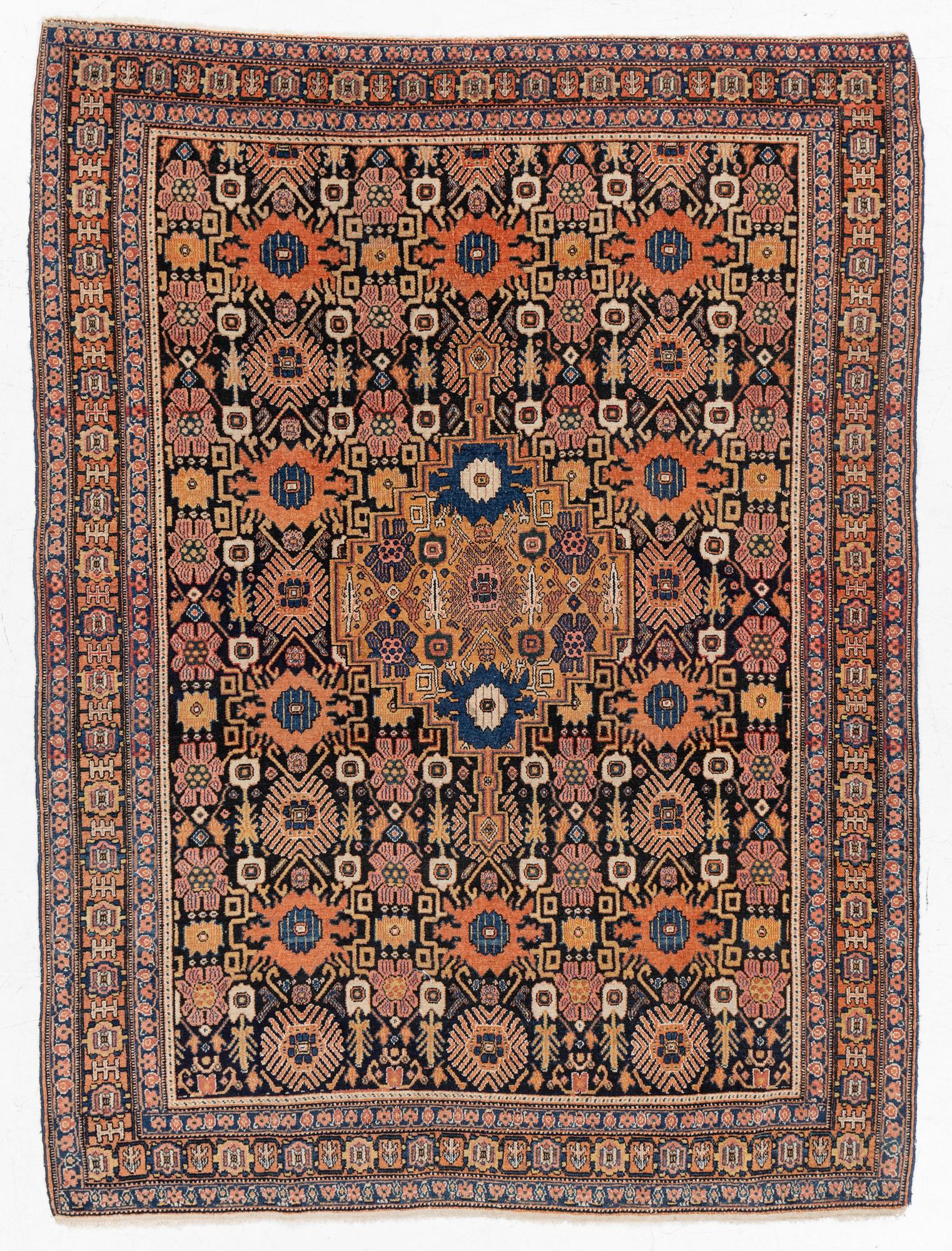 A Senneh carpet, c. 187 x 140 cm.