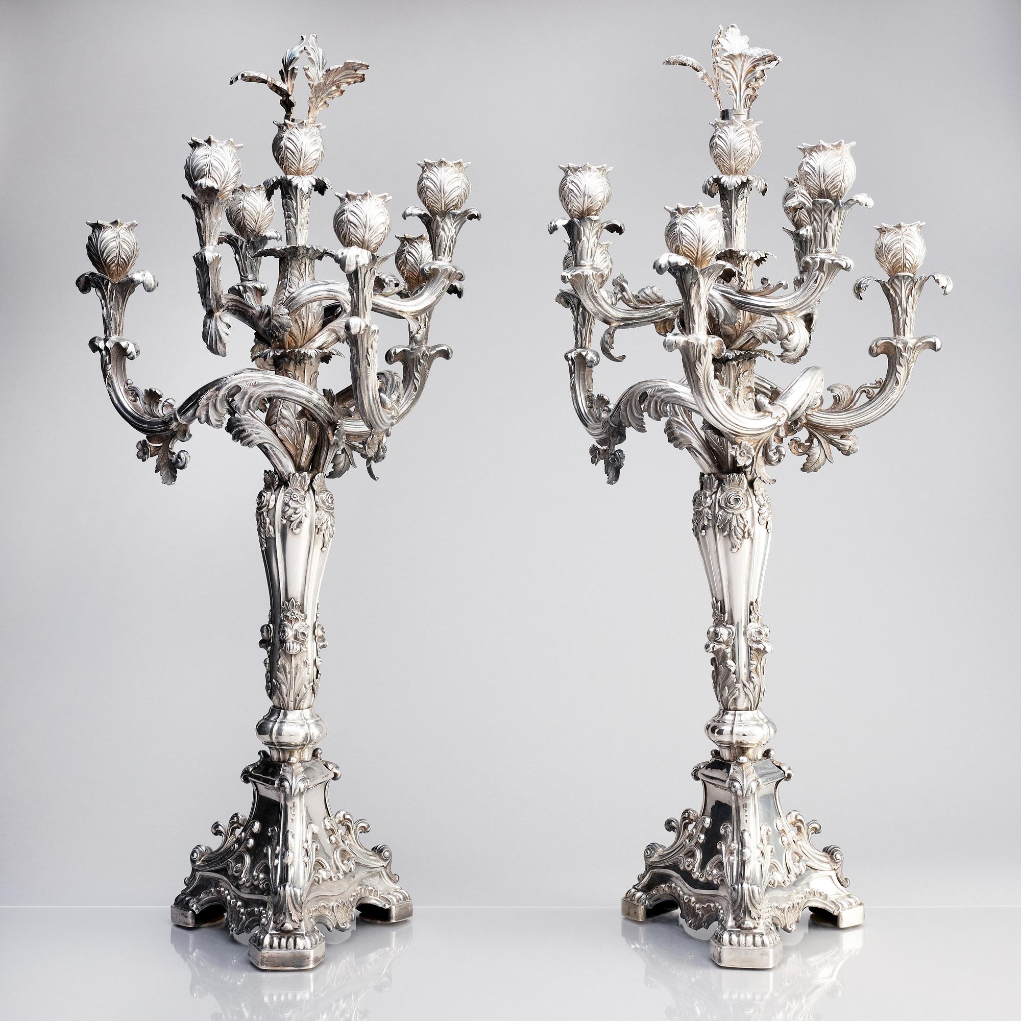 A pair of Swedish mid 19th century silver candelabra, marks of Gustaf Möllenborg, Stockholm 1844.