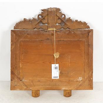 A mid 19th century mirror sconce.