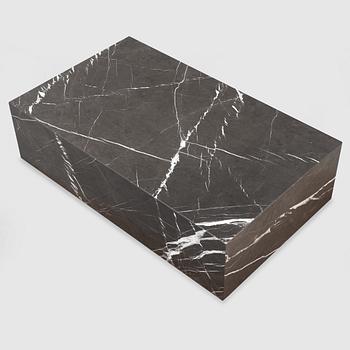 A marble 'Plinth' coffee table from Menu.